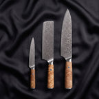 Nishiki Knife Trio (Gyuto, Nakiri & Petty) · the full set on black silk