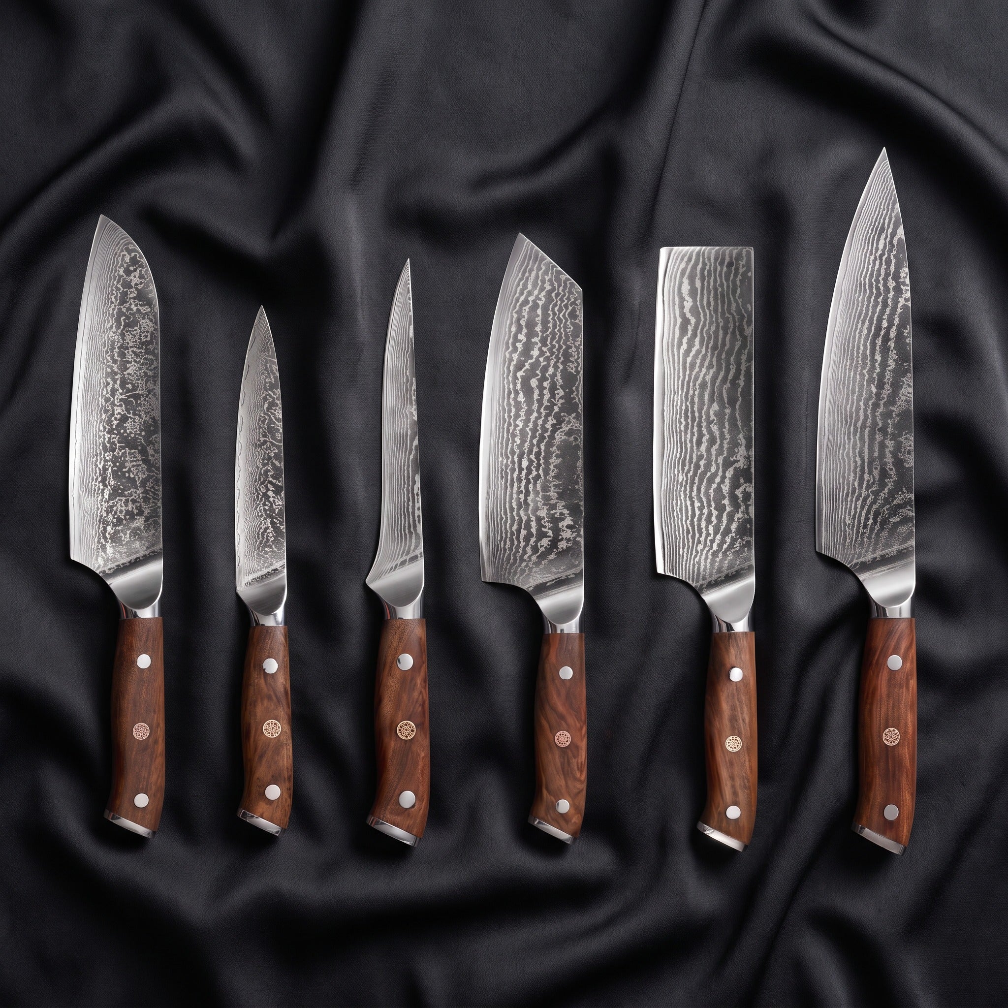 Okami Damascus Knife Set · the full set on black silk
