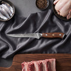 Okami Damascus Knife Set · Honesuki on the cutting board
