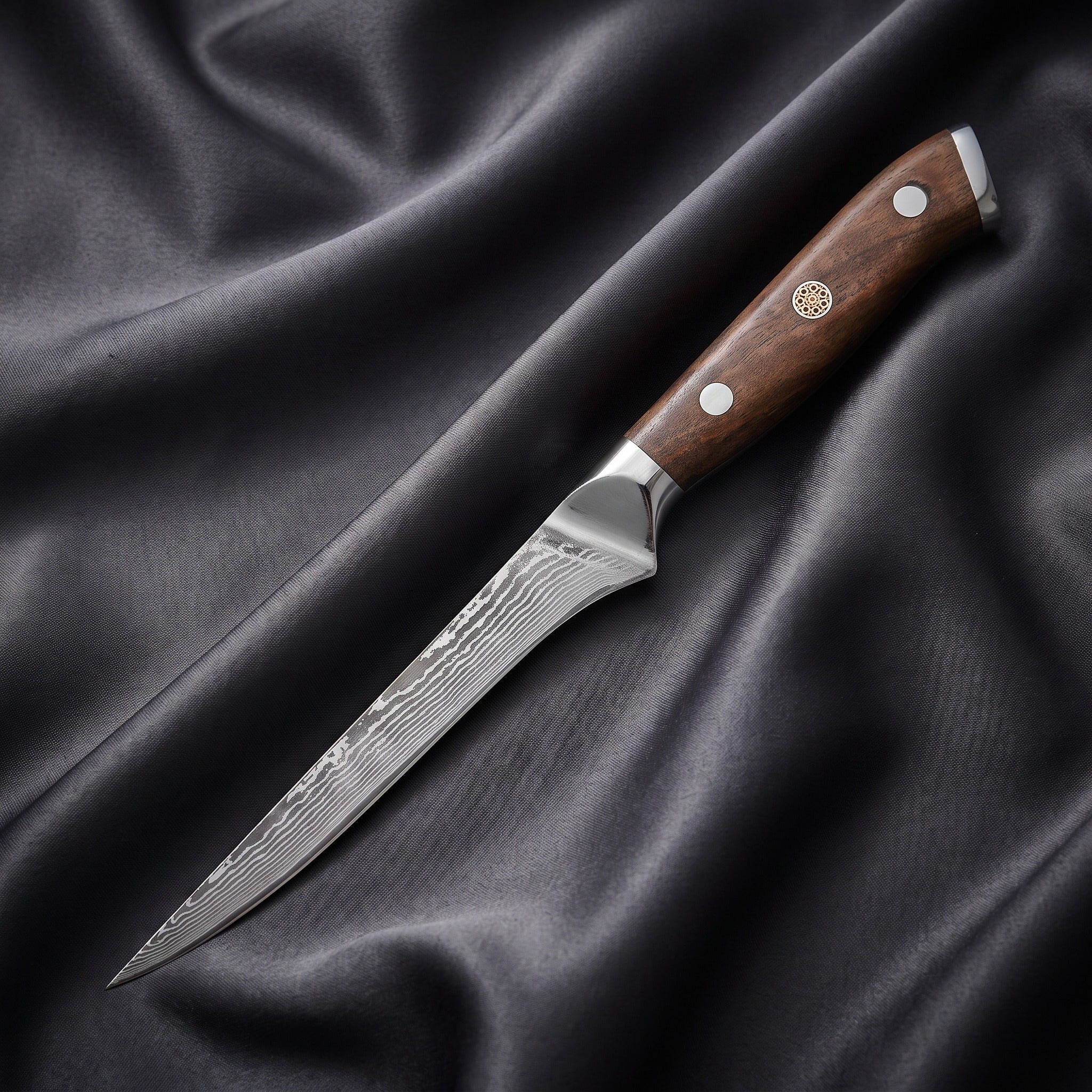 Okami Honesuki Boning Knife · full blade on black silk