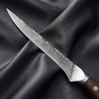 Okami Honesuki Boning Knife · Damascus blade close-up