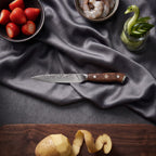 Okami Knife Trio (Gyuto, Nakiri & Petty) · Petty on the cutting board