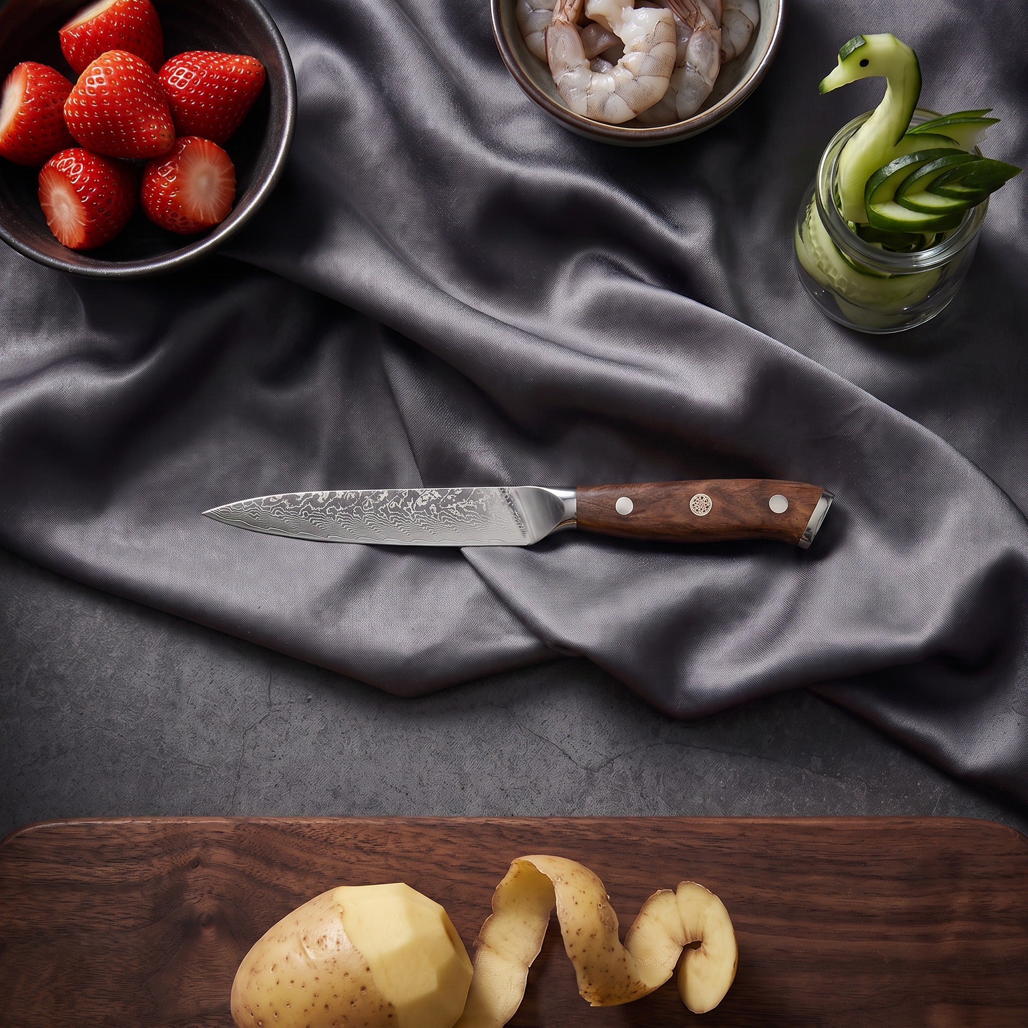 Okami Knife Trio (Gyuto, Nakiri & Petty) · Petty on the cutting board