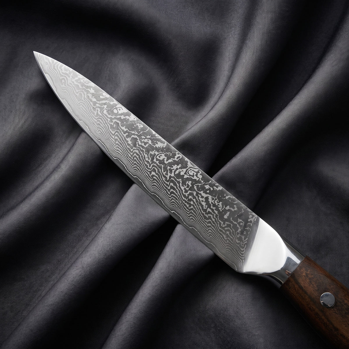 Okami Petty Utility Knife · Damascus blade close-up