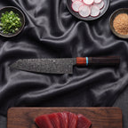 Raiden Kiritsuke Chef-Slicer Knife · on the cutting board