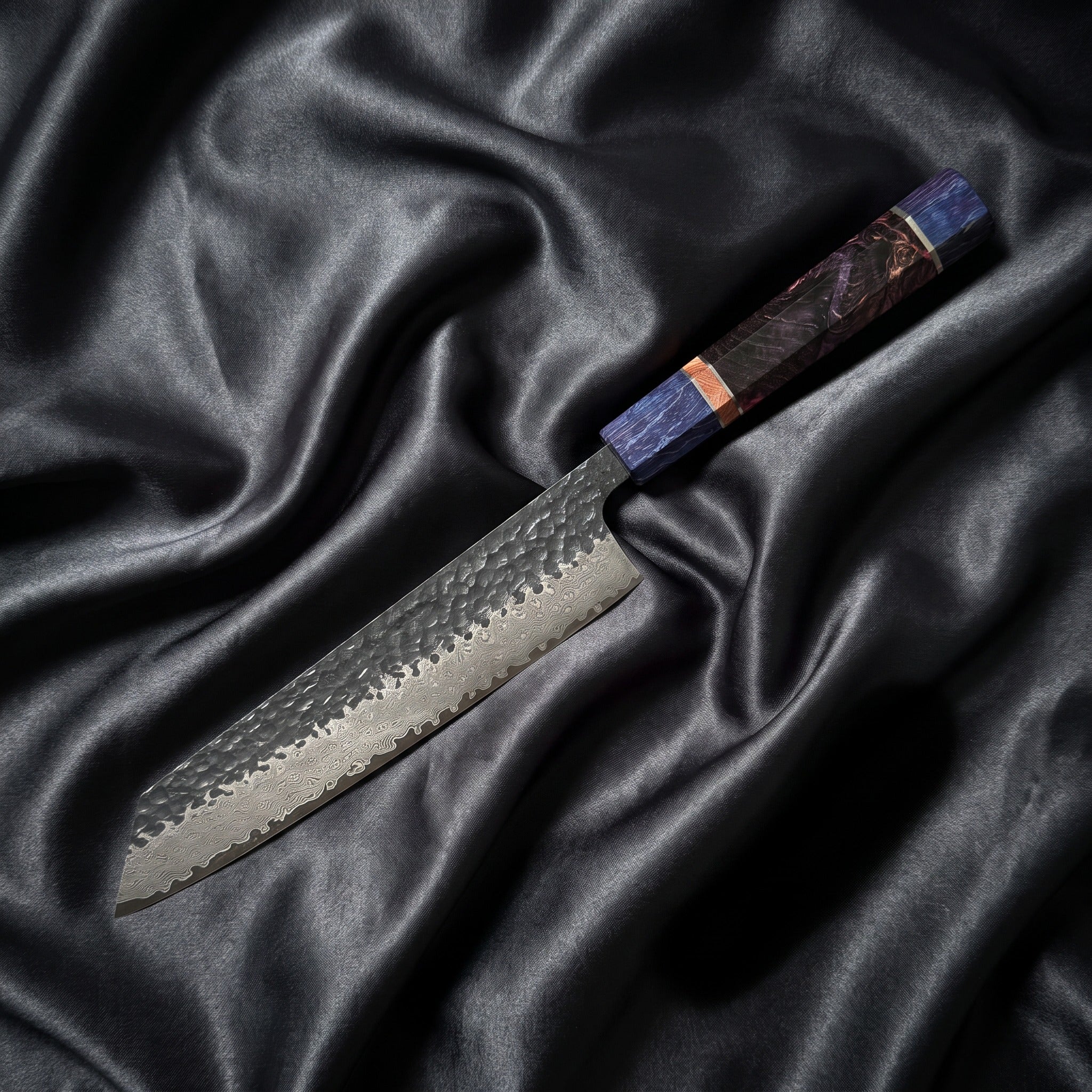 Rekka Kiritsuke Chef Knife · full blade on black silk