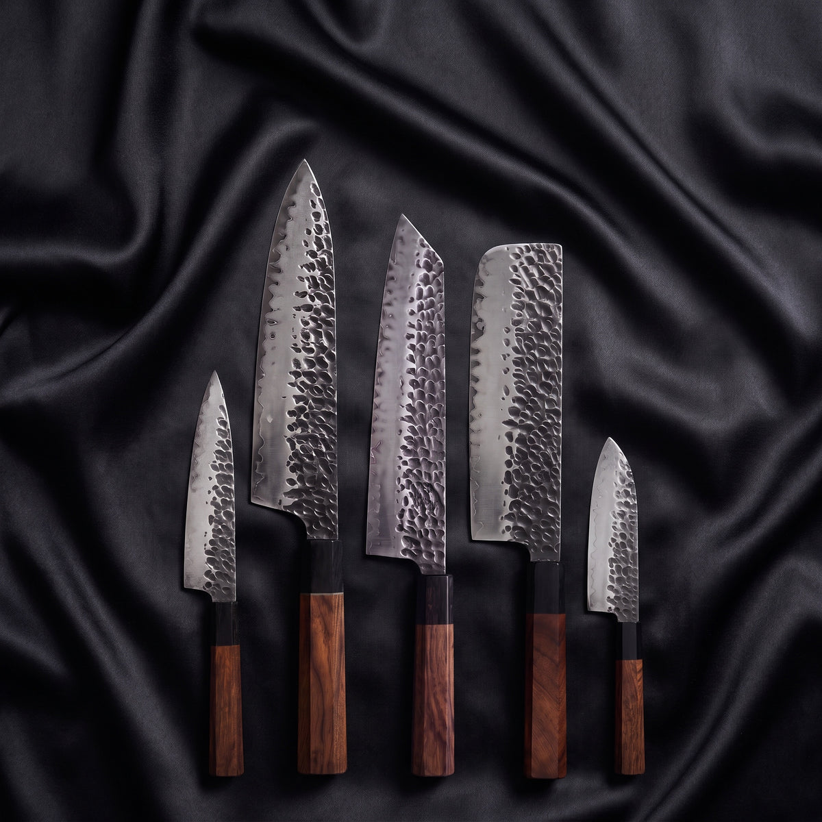 Shigure Damascus Knife Set · the full set on black silk