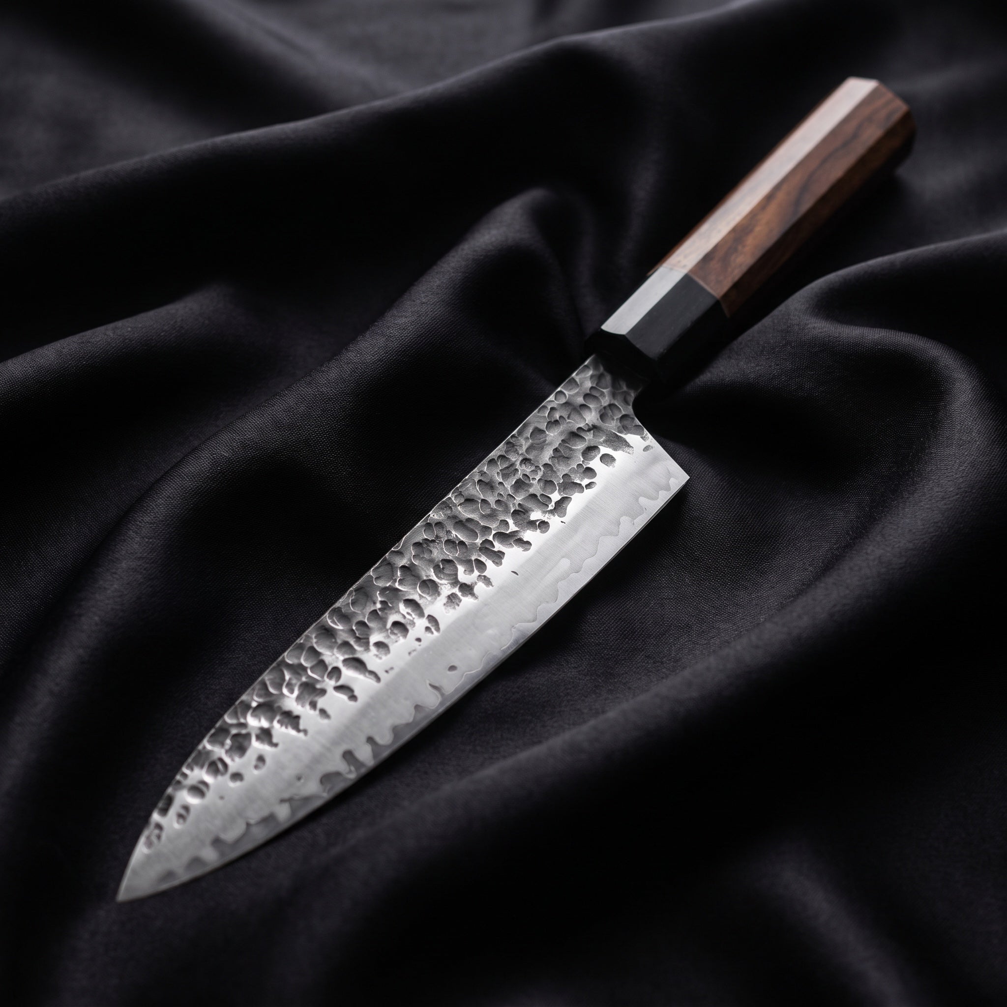 Shigure Gyuto Chef Knife · full blade on black silk