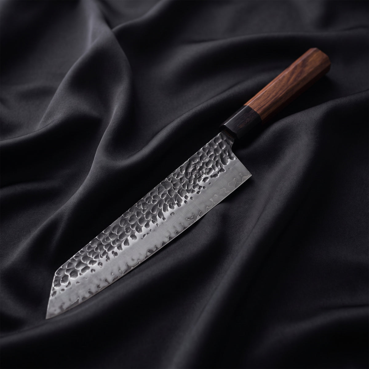Shigure Kiritsuke Chef Knife · full blade on black silk