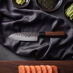 Shigure Santoku All-Purpose Knife · on the cutting board