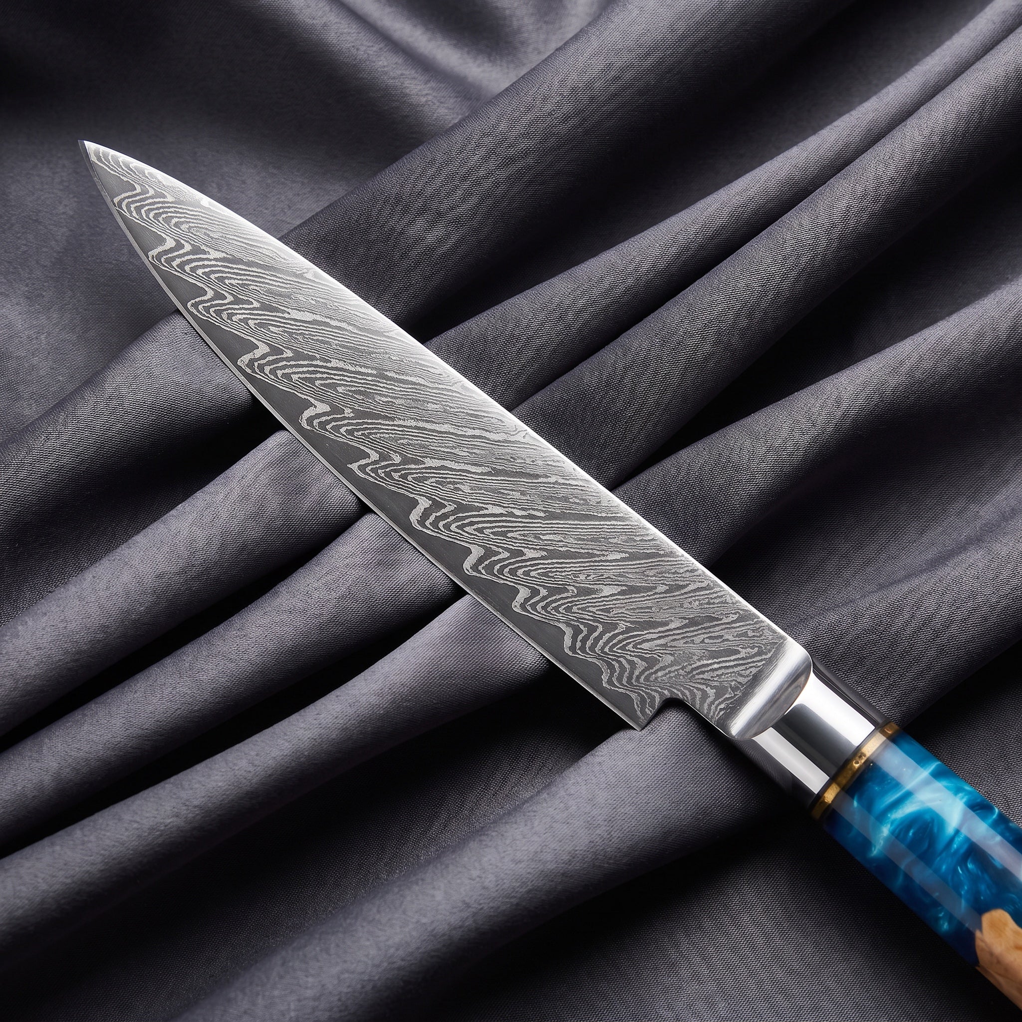 Shion Petty Utility Knife · Damascus blade close-up