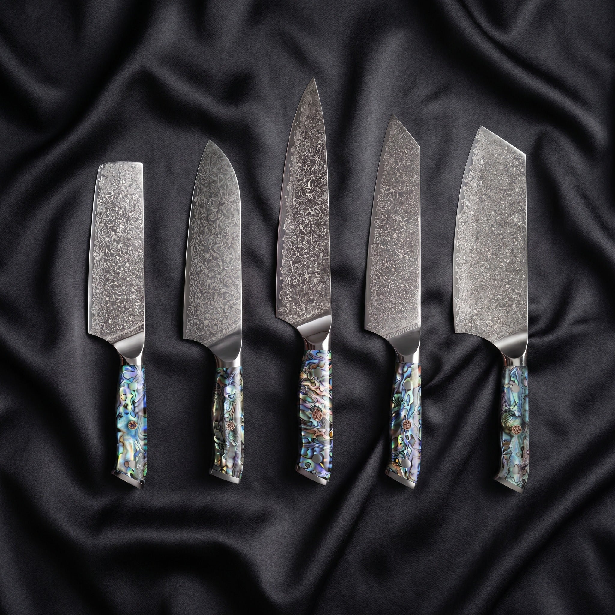 Shizuku Damascus Knife Set · the full set on black silk