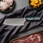 Shizuku Damascus Knife Set · Cleaver on the cutting board