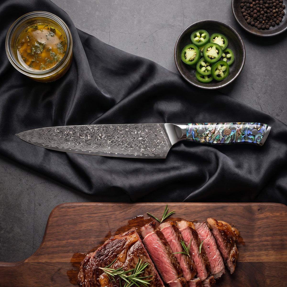 Shizuku Damascus Knife Set · Gyuto on the cutting board