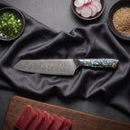 Shizuku Damascus Knife Set · Kiritsuke on the cutting board