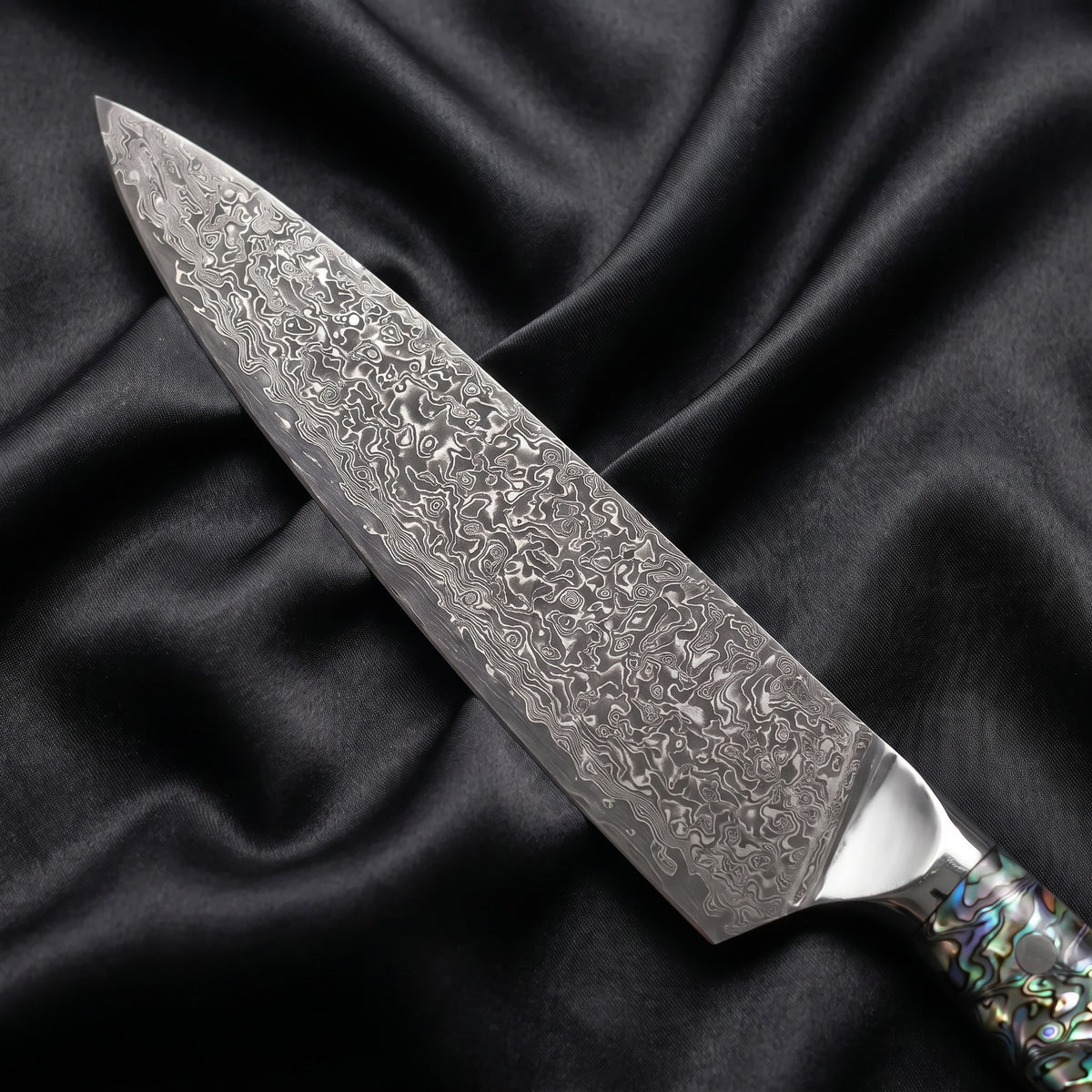 Shizuku Gyuto Chef Knife · Damascus blade close-up