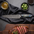 Shizuku Knife Duo (Gyuto & Santoku) · on the cutting board