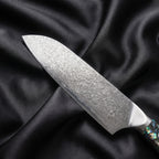 Shizuku Santoku Knife · Damascus blade close-up