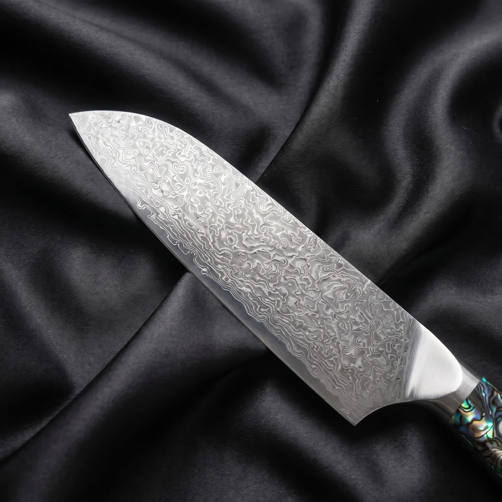 Shizuku Santoku Knife · Damascus blade close-up