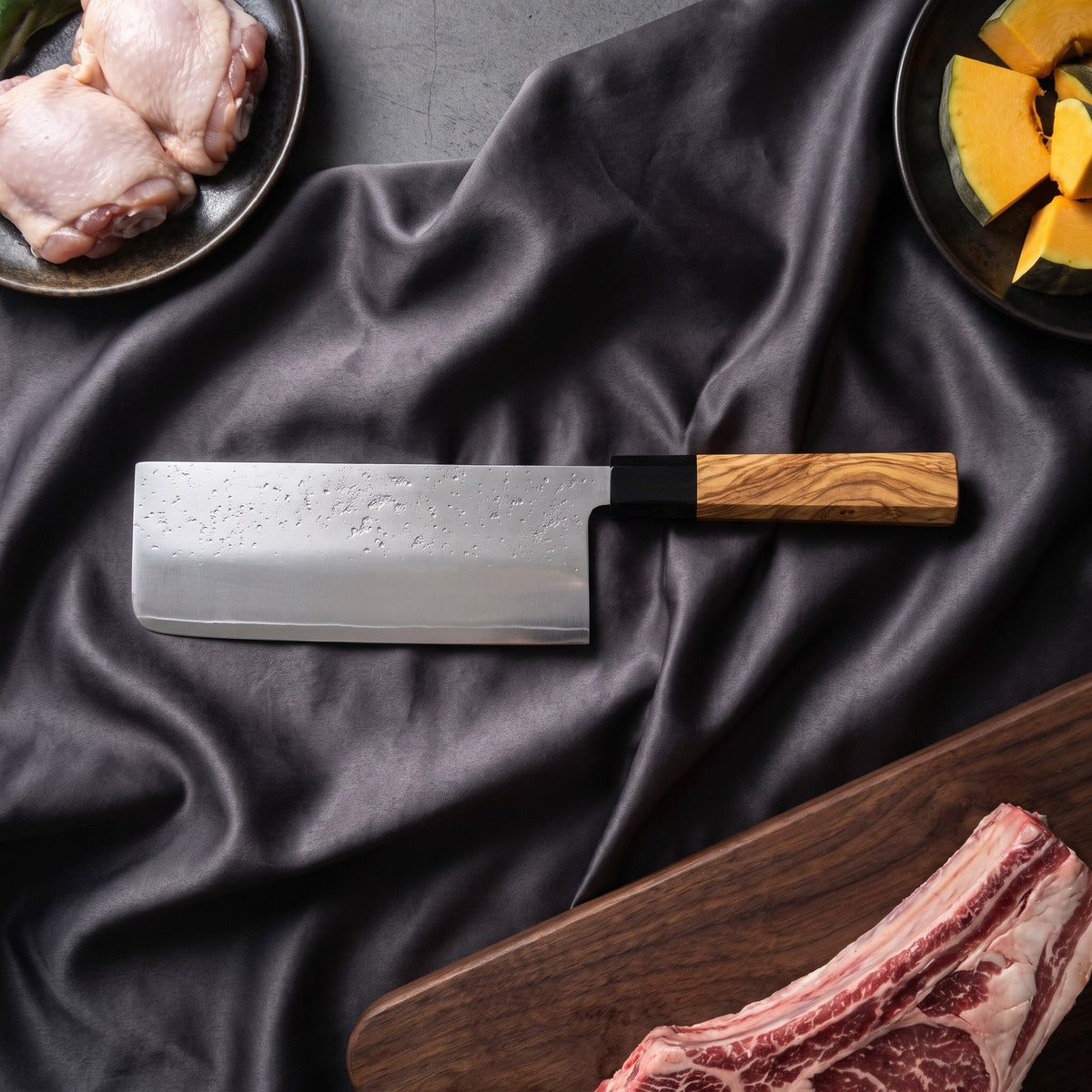 Sora Cleaver Knife · on the cutting board