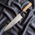 Sora Gyuto Chef Knife · full blade on black silk