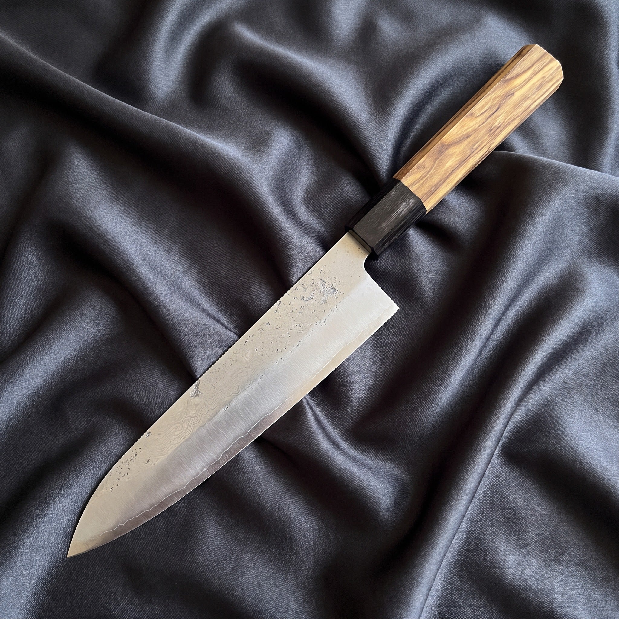 Sora Gyuto Chef Knife · full blade on black silk