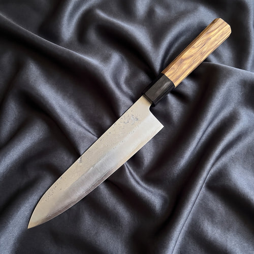 Sora Gyuto Chef Knife · full blade on black silk