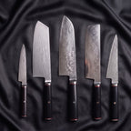 Tsurugi Damascus Knife Set · the full set on black silk