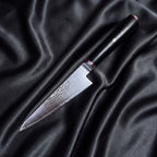 Tsurugi Honesuki Boning Knife · full blade on black silk