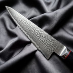 Tsurugi Honesuki Boning Knife · Damascus blade close-up