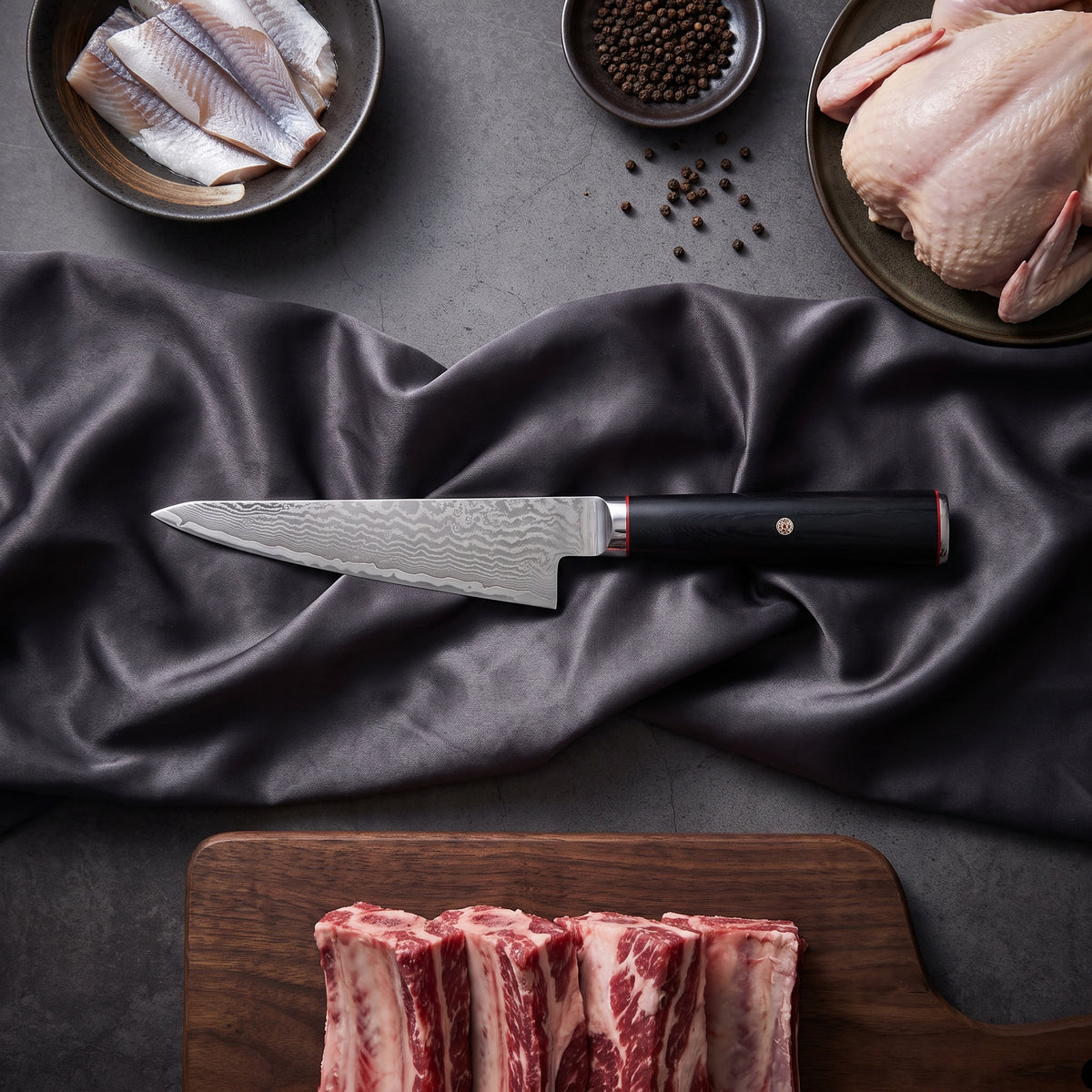 Tsurugi Honesuki Boning Knife · on the cutting board