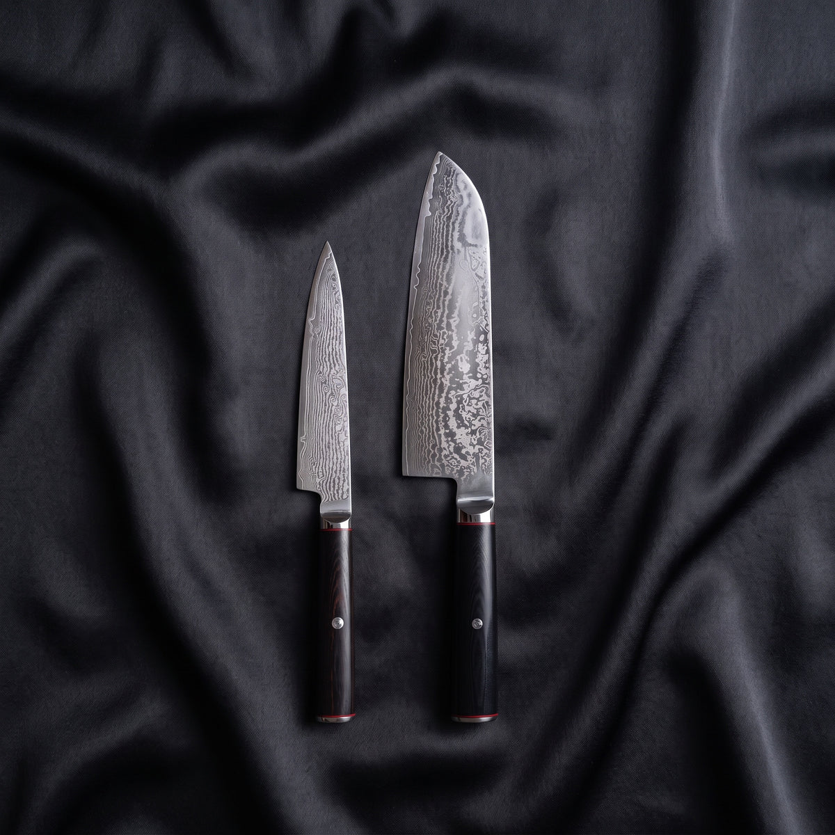 Tsurugi Knife Duo (Santoku & Petty) · the full set on black silk