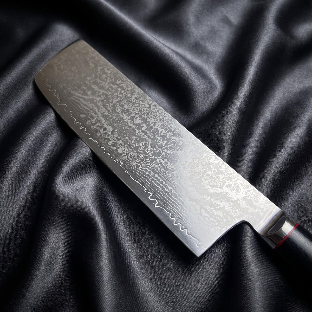 Tsurugi Nakiri Knife · Damascus blade close-up
